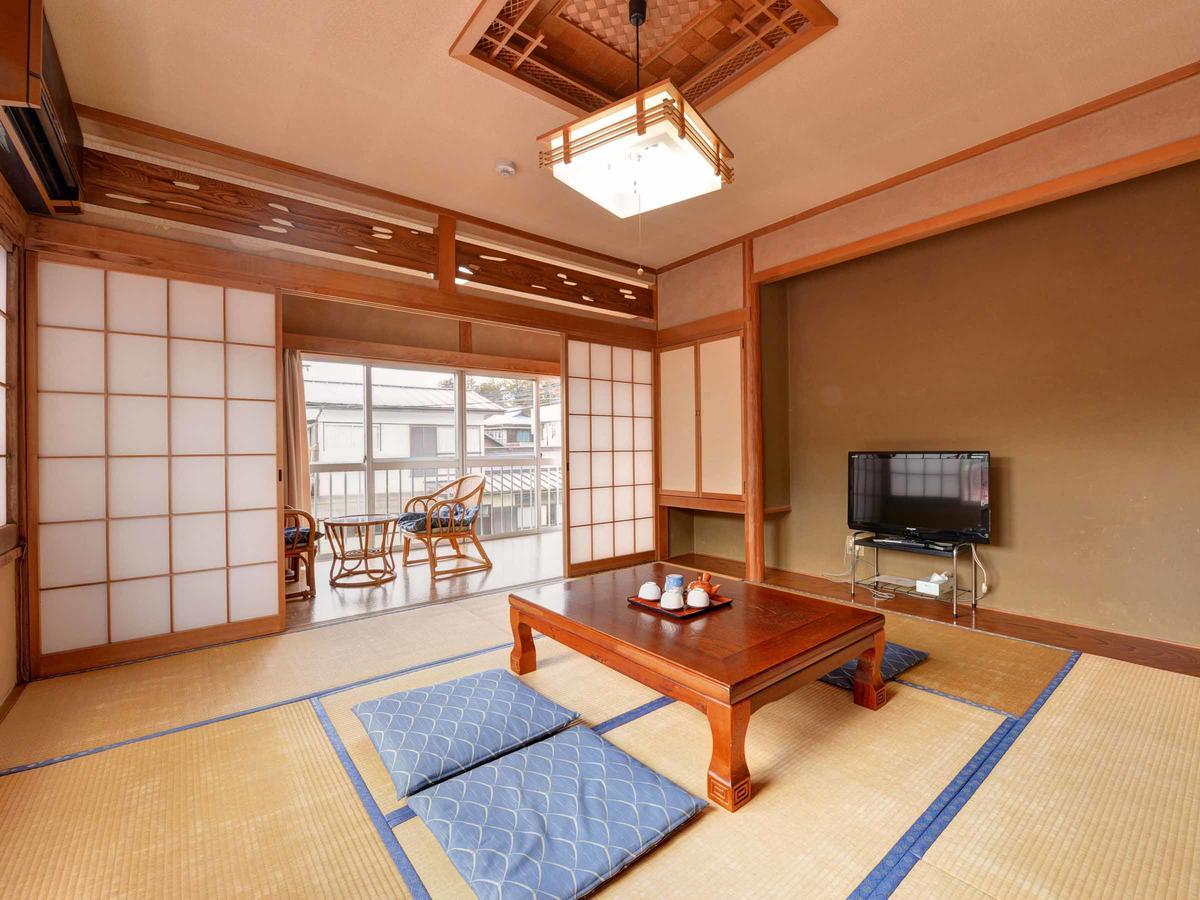 Suzukiya Ryokan Hotel Daigo Bagian luar foto