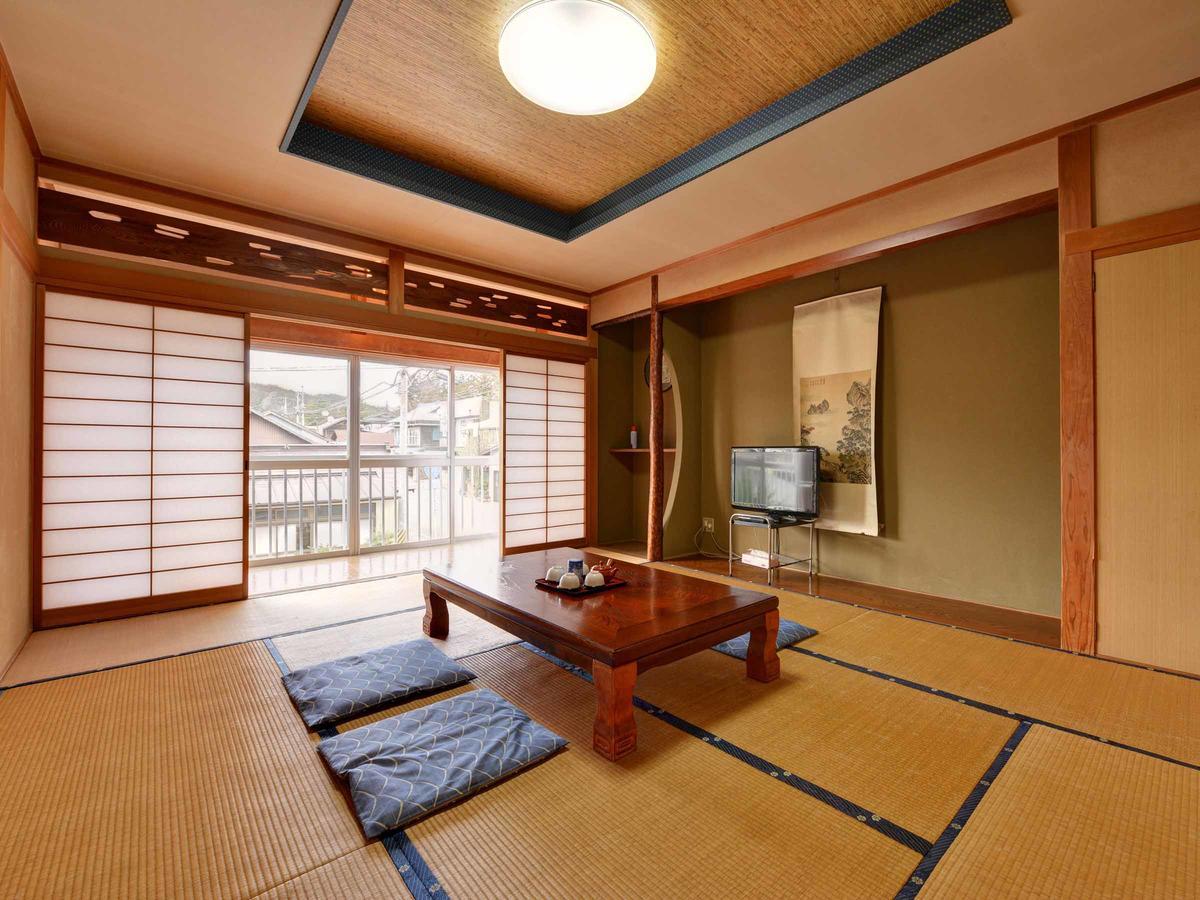 Suzukiya Ryokan Hotel Daigo Bagian luar foto